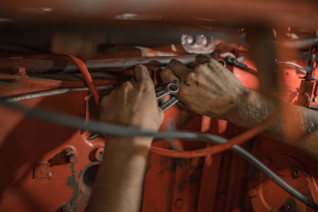 Experienced automotive professionals in professional workshop